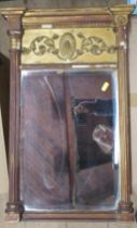 An Antique gilt framed wall mirror, of rectangular form, overall size 24ins x 15.5ins