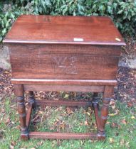 An antique style oak bible box raised on a stand, width 21ins, height 28ins, depth 15ins