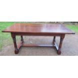 An oak dining table, width 35ins, length 72ins, height 30ins