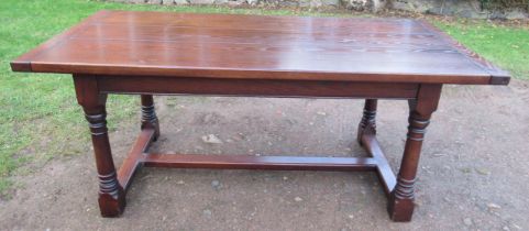 An oak dining table, width 35ins, length 72ins, height 30ins