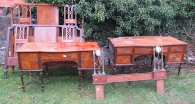 A 19th century/early 20th century bedroom suite, comprising dressing table, table, bedstead,