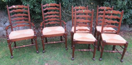 A set of 6 ( 4+2) ladder back chairs, with rush seats