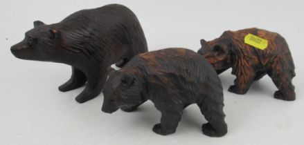 A group of three Black Forest carved wooden bears