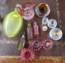 A collection of 19th century glass, to include a ribbed glass flask, match strikers, perfume bottles