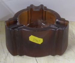 An Art Deco amber glass ashtray