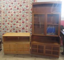 A Nathan wall unit, height 76ins, width 40ins, depth 18ins, together with another Nathan unit, 40ins