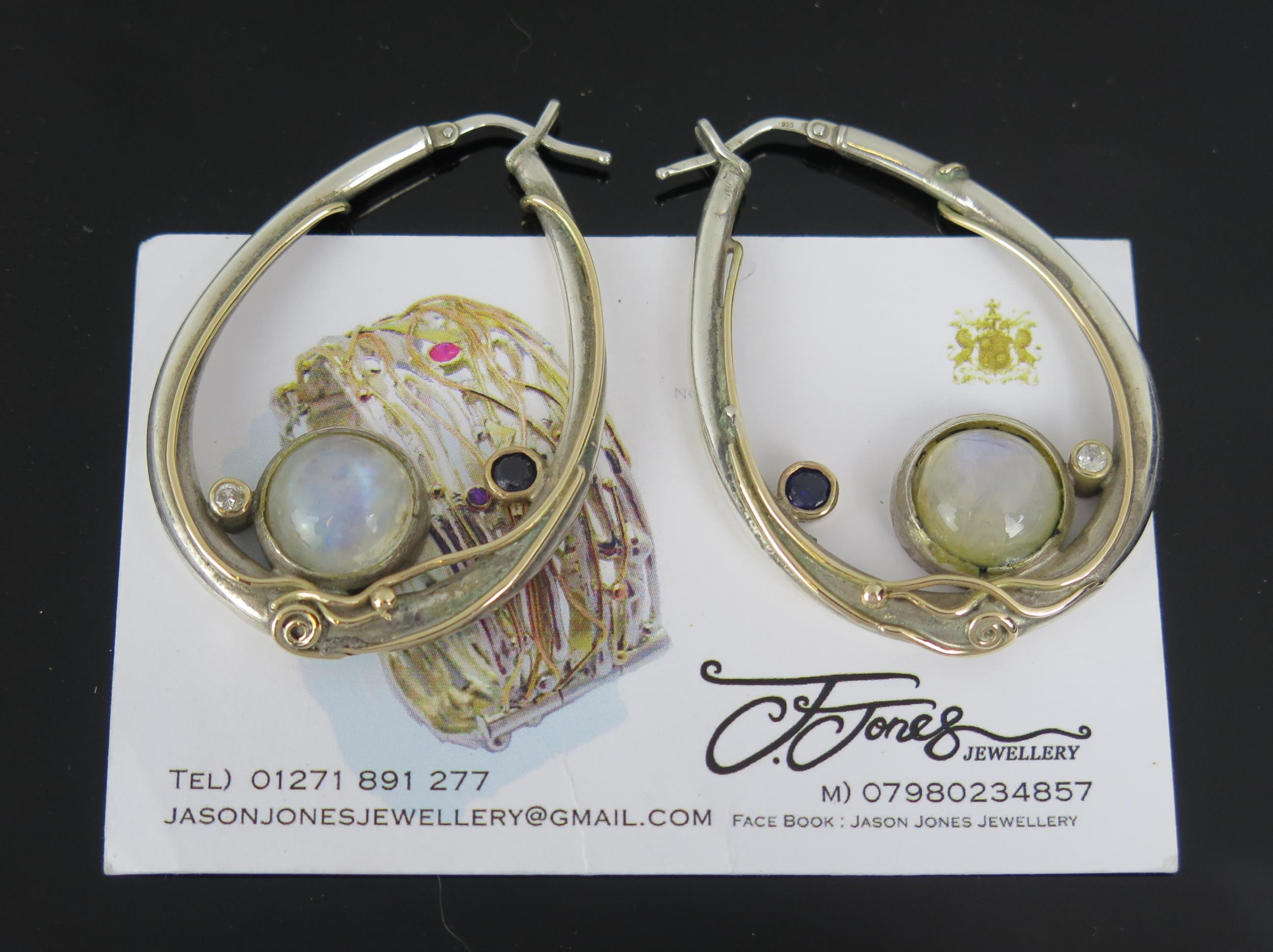 A pair of Jason Jones silver and gold moonstone, tanzanite and diamond handmade earrings 52mm drop