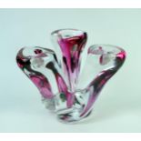 A 20th Century crystal glass three branch candelabra, clear and cranberry glass, Val St Lambert