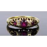 Ruby and Old Cut Diamond Ring in an 18ct stamped gold setting, c. 4.9x4.2mm central stone, size P.