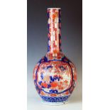 Japanese Meiji Period Imari vase of bottle form, decorated with garden scenes, 51cm 20 1/4inches.