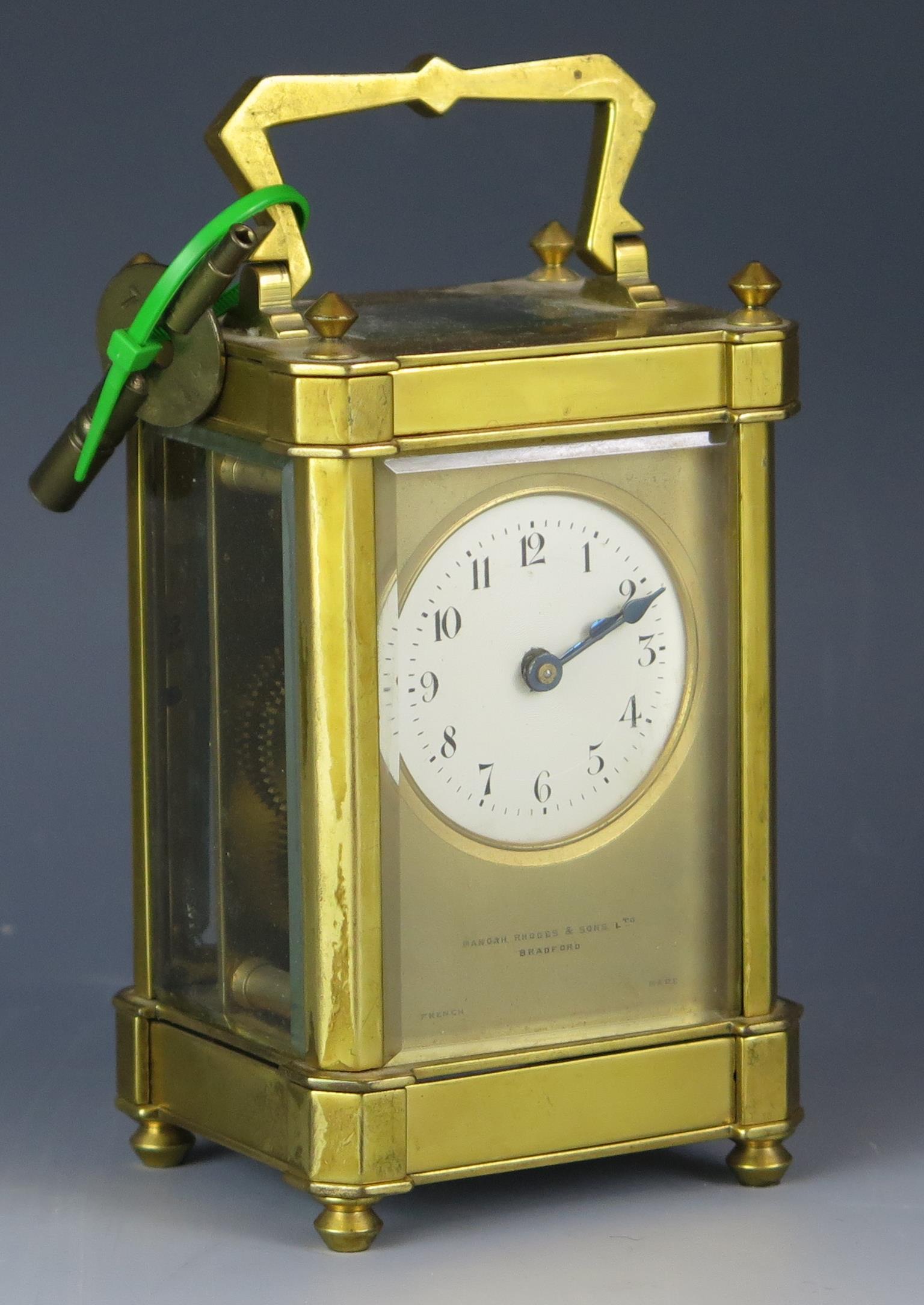 19th Century French Brass Carriage Clock retailed by Manoah Rhodes & Sons Ltd., Bradford, 15cm.