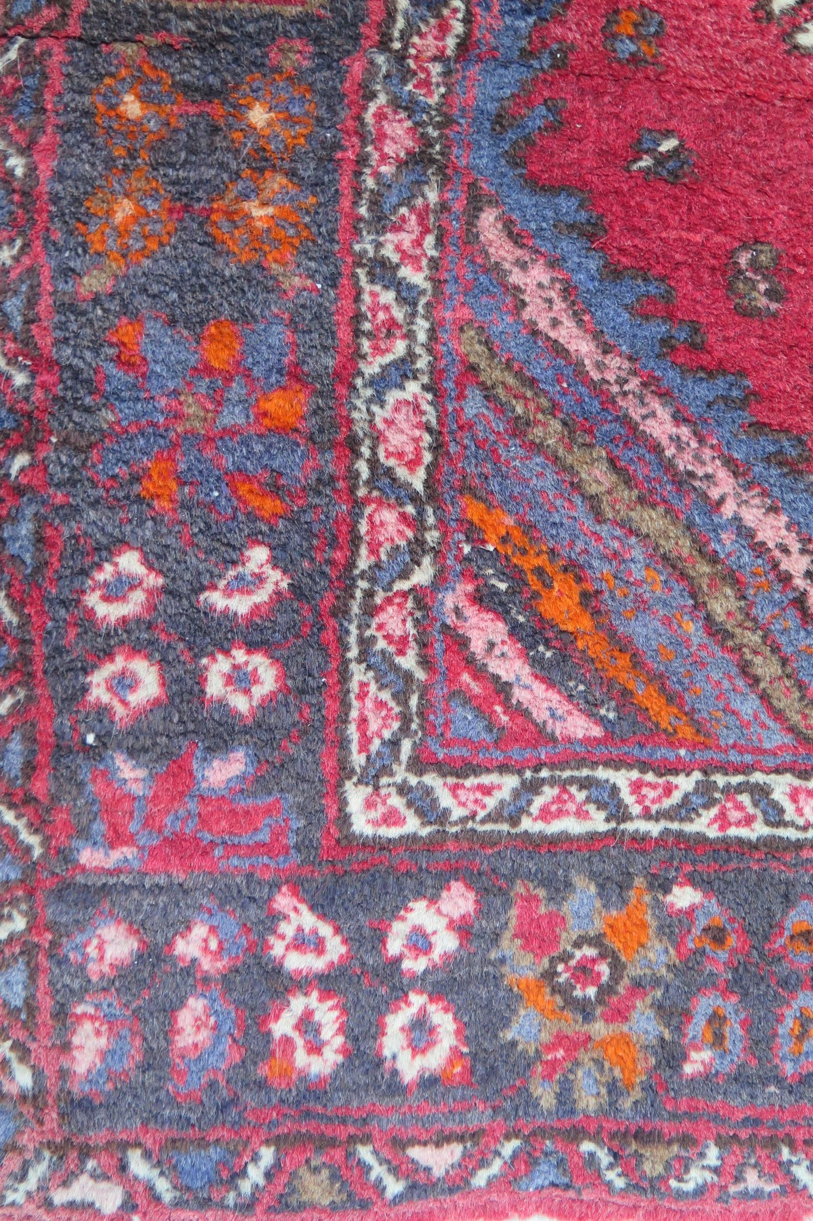 A large 20th Century Turkish Runner, wool carpet, geometric diamond lozenges, red ground, pyramid - Image 2 of 7