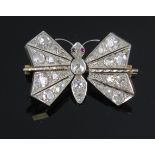 A Diamond Set En Tremblant Butterfly Brooch with spring mounted wings, set with old round cuts and