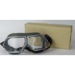 A pair of aluminium framed aviator's goggles, contained in a card box.