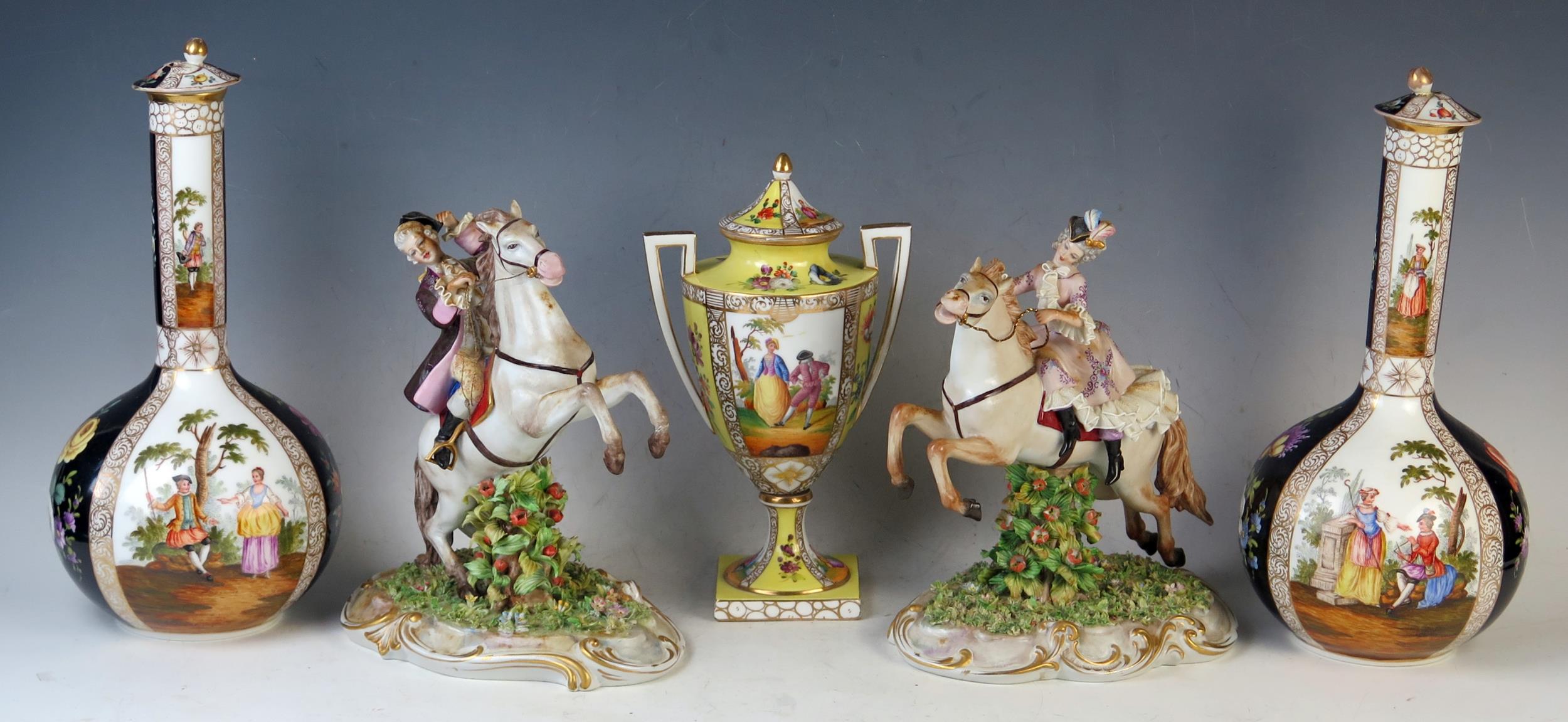 Pair of Dresden Porcelain Bottle Vases and Covers with a black ground, together with a yellow ground