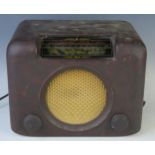 A mid 20th Century, Vintage Brown Bakelite Bush Radio, and cable.