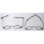 Two Pairs of Early 19th Century Silver Framed Spectacles, both with indistinct part hallmarks (one