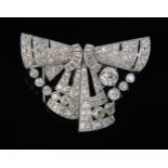 A Large Art Deco Diamond Clip Brooch in an unmarked platinum or white gold setting set with old