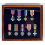 Greek Phoenix Order Nine Medal Group of Miniatures comprising C.B.E., D.S.O. War Medal with oak