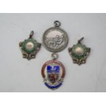 Three silver swimming medallions, together with a silver life saving medal 43gms, 1.39ozs.