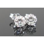 A Pair of Diamond Stud Earrings, 18ct white gold clips stamped 750, EDW 1.5ct, 2.8g