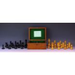 Jaques, London, a boxwood and ebonised Staunton pattern weighted chess set, the black king stamped