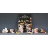 A collection of eight Royal Crown Derby paperweights, in the form of animals and birds, together