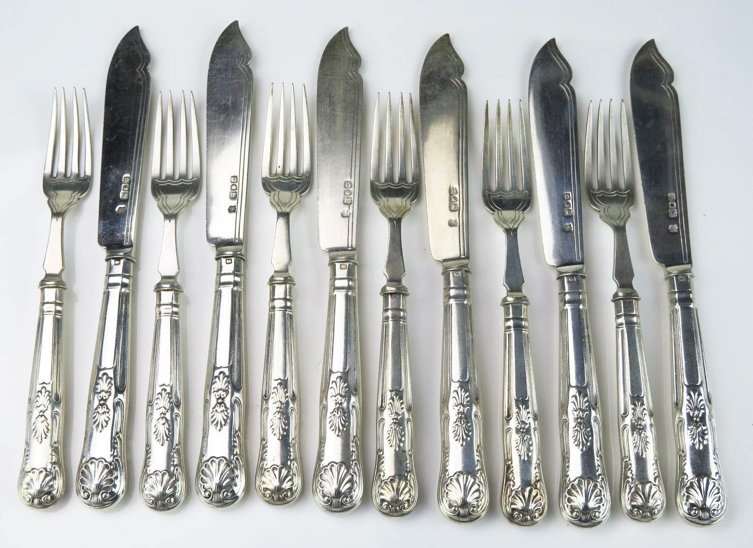 A set of six late Victorian Kings pattern fish knives and six matching forks, maker Goldsmiths &