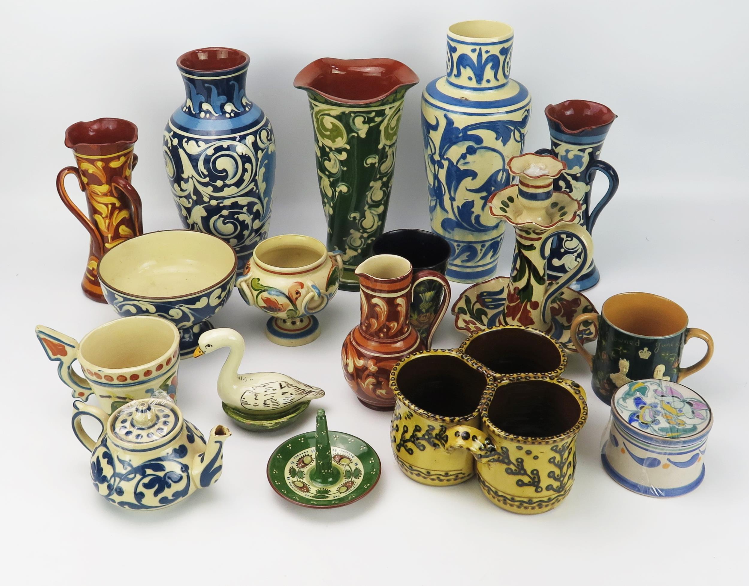A collection of Aller Vale and other pottery items, including, vases, candlestick, bowls and jugs.