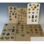 Collection of Military Cap Badges including R.N.D., Royal Marines, Navy, Scottish King's