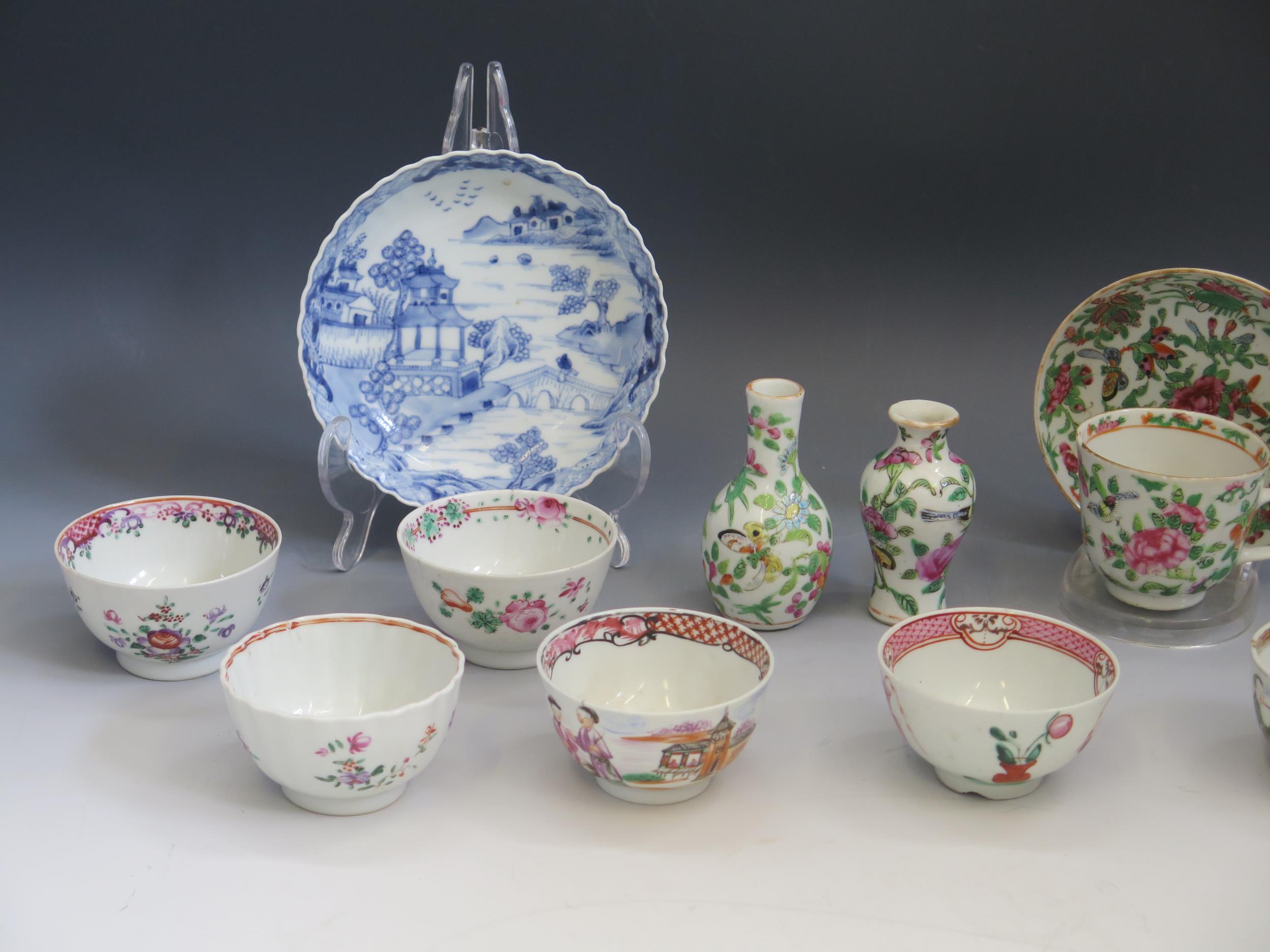 A Cantonese famille vert porcelain cup and saucer, two miniature vases 8cm and 9cm high, a blue - Image 2 of 3