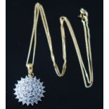 An 18ct Gold and Diamond Cluster Pendant on a 17.5" (44cm) chain, the pendant set with 1ct of clocks