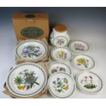 A collection of Portmeirion 'The Botanic Garden' pattern dinner plates, side plates, biscuit jar and