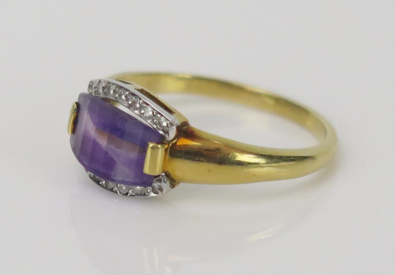 Amethyst and Diamond Dress Ring in an 18ct hallmarked setting, 10x7mm slice cut amethyst, size P. - Image 2 of 2