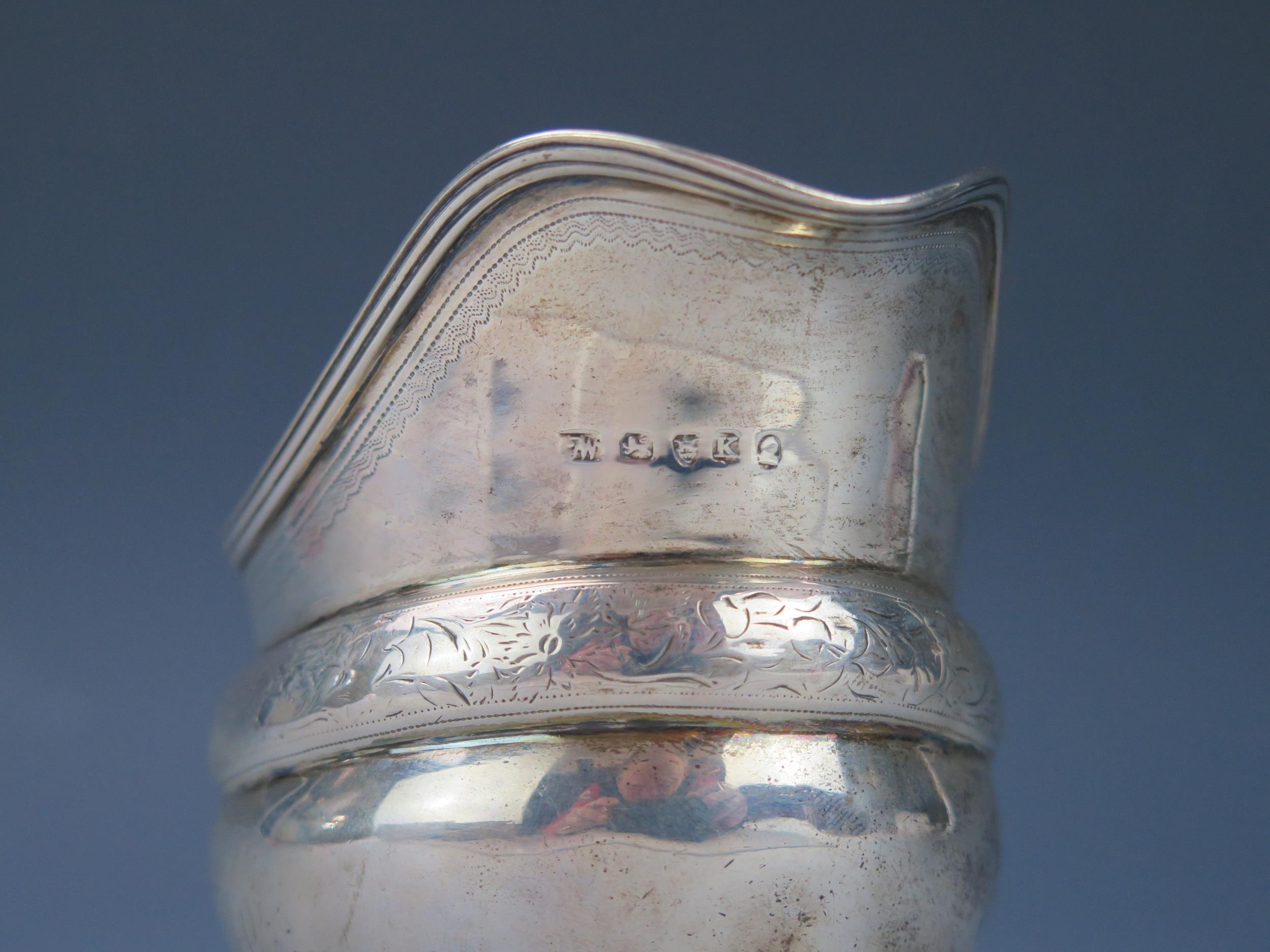 A George III silver cream jug, maker's mark worn, London, 1805, initialled, of barge-shaped outline, - Image 2 of 2