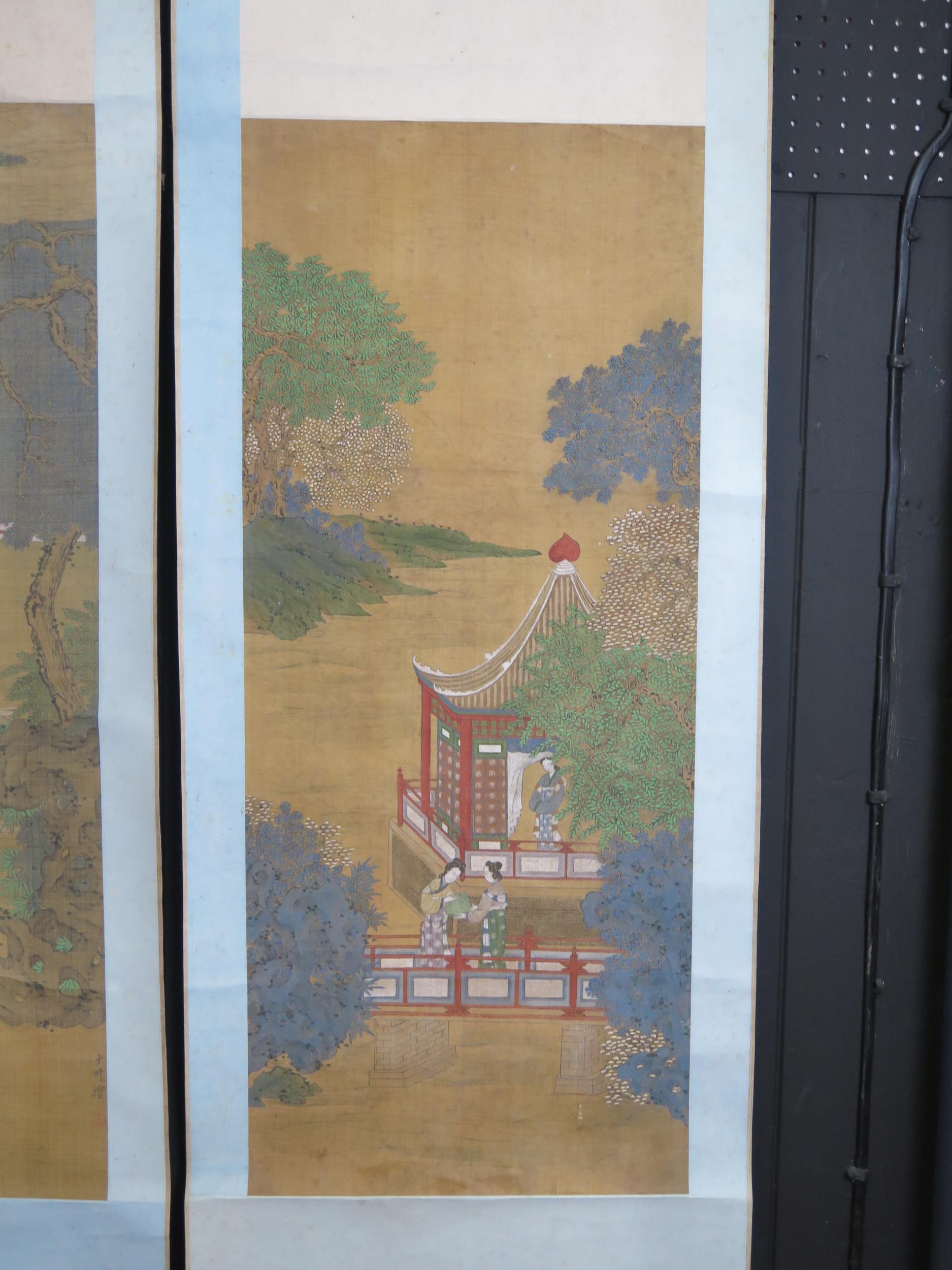 A pair of late 19th century Chinese scroll work pictures, depicting figures in a pagoda landscape, - Image 4 of 6
