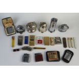 Collection of Lighters including , Evans table lighter in sterling silver sleeve, Parker Roller