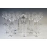 A part suite of drinking glasses, with palmette decoration, includes red and white wine glasses,