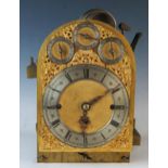 A late 19th century mahogany directors clock of arched outline, the arched brass dial with