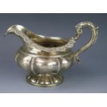 A William IV silver cream jug, maker Edward, Edward Jnr., John & William Barnard, London, 1831,