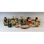 A collection of Aller Vale and Torquay miniature wares, includes; candlestick, dish, jugs, match