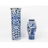 A Chinese blue and white vase of ovoid form, decorated with figures carrying large vases and covers,