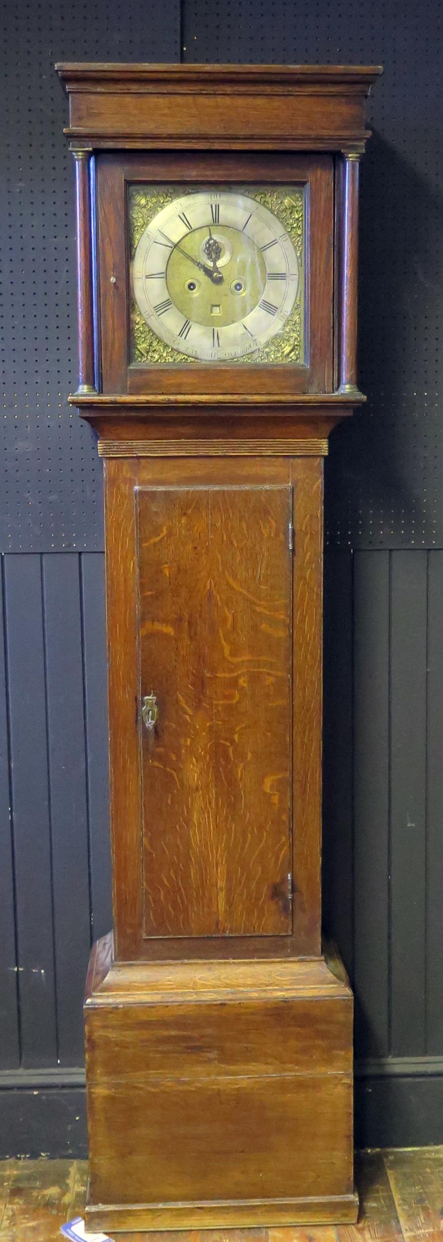 Taylor Oxford, a 19th century oak longcase clock, having a square hood, the trunk with plain panel