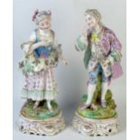 Pair of late 19th Century Continental Figures of Amours, not marked, 34cm high,