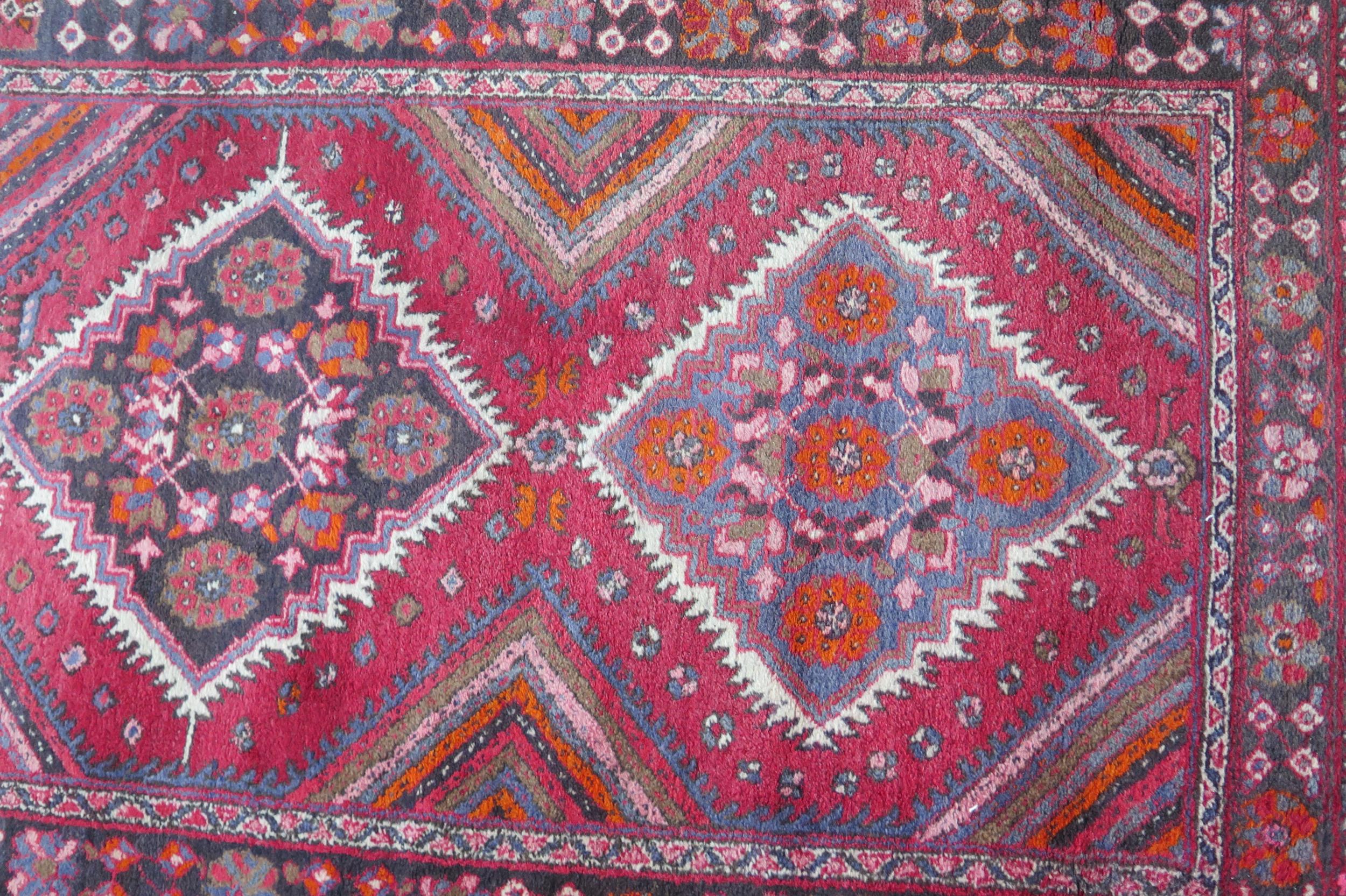 A large 20th Century Turkish Runner, wool carpet, geometric diamond lozenges, red ground, pyramid - Image 7 of 7