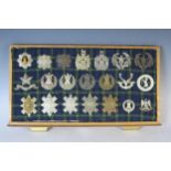 Collection of Military Helmet and Cap badges including The Royal Scots, Black Watch, King's Own