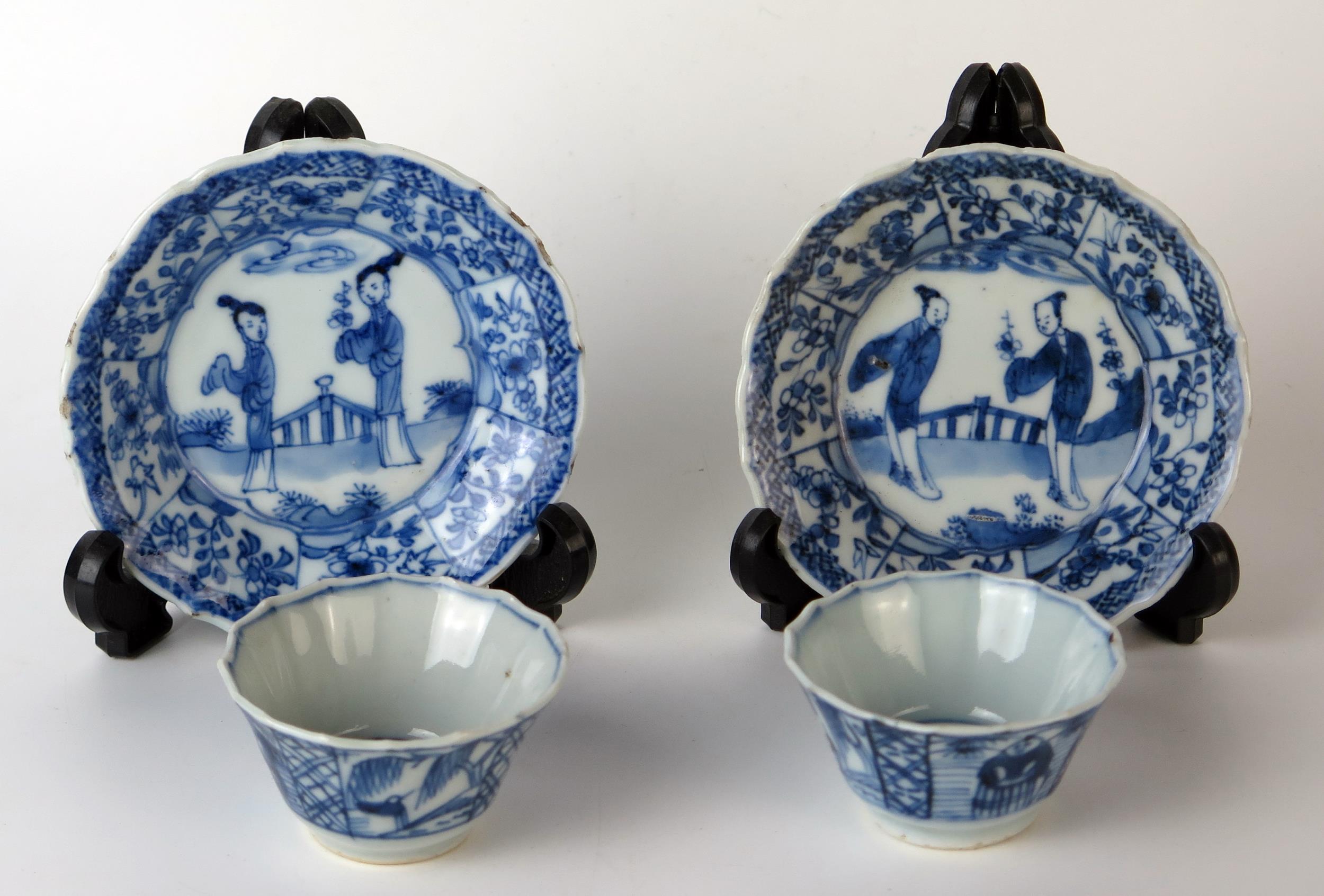 Pair of Chinese Export Blue and White Tea Bowls and Saucers of canted form, decorated with Long Liza