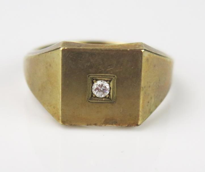 A 9ct Gold Gentleman's Signet Ring, with small diamond inset, Birmingham hallmark, ring size U.5