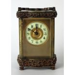 A late 19th century French brass carriage timepiece, with 5cm Arabic dial, the single train movement