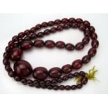 Faux Cherry Amber Oval Bead Necklace, 39" (89cm), largest bead 26x22mm, 73.8g